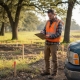 Civil engineer conducting property site assessment